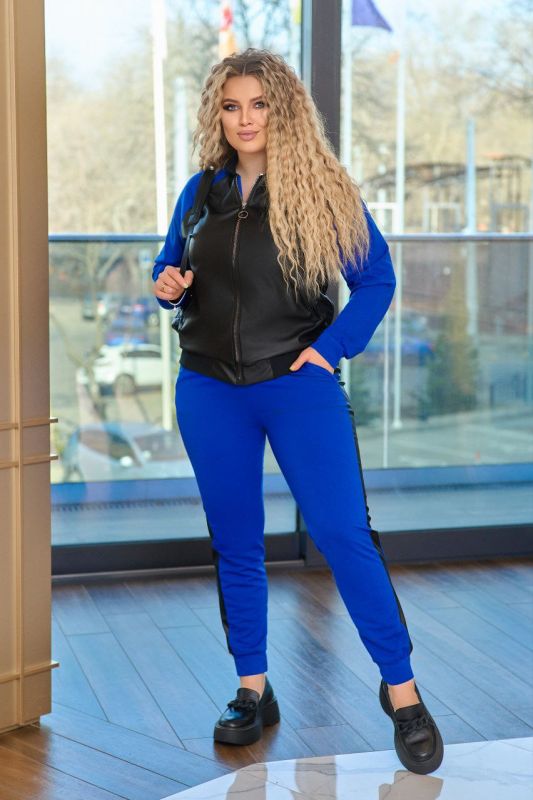 🔥🔥🔥РОЗПРОДАЖ 🔥🔥🔥 Костюм " бомбер " Тканина: Двухнитка ,не кашлатиться,+ эко шкіра високої якості, + манжет і горловина з ребани. Додаткові характеристики: Сезон осінь - весна. Бомбер спереді та по спинці з эко шкіри, рукава та штанці з Двухнитки, з кишенями. На рукавах та по низу кофти є манжет, комірець стійка з ребани. Штани з манжетами по низу, посадка вище середньої, зручний шов сидіння, пояс на резинці- простроченний на спеціальному обладнанні для хорошої фіксаціі резинки, з кишенями.