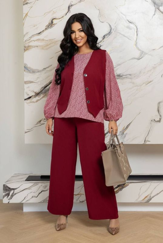 Знижки!!Костюм трійка Тканина : креп - костюмка + софт Довжина жилетки : 62 см. Довжина блузи : 65 см. Довжина рукава : 61 см. Довжина штанів : 105 см. (пояс на гумці ) Трендова трійка цього сезону - штани + жилетка + блуза , штани вільного покрою , з бічними кишенями , пояс на гумці . Жилетка прямого покрою , на ґудзиках , з заду завʼязка . Блуза з обʼємними рукавами низ на резинці . Тканина гарної якості , зносостійка , не леняє , не кашлатиться , приємна на дотик .